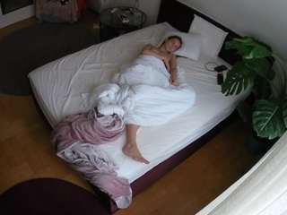 voyeurcam-julmodels-whitebed-5 webcam model stream image