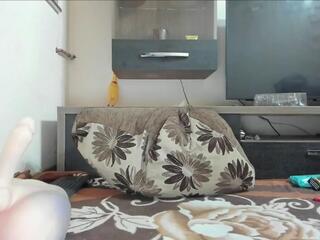 Kelly Behind webcam model stream image